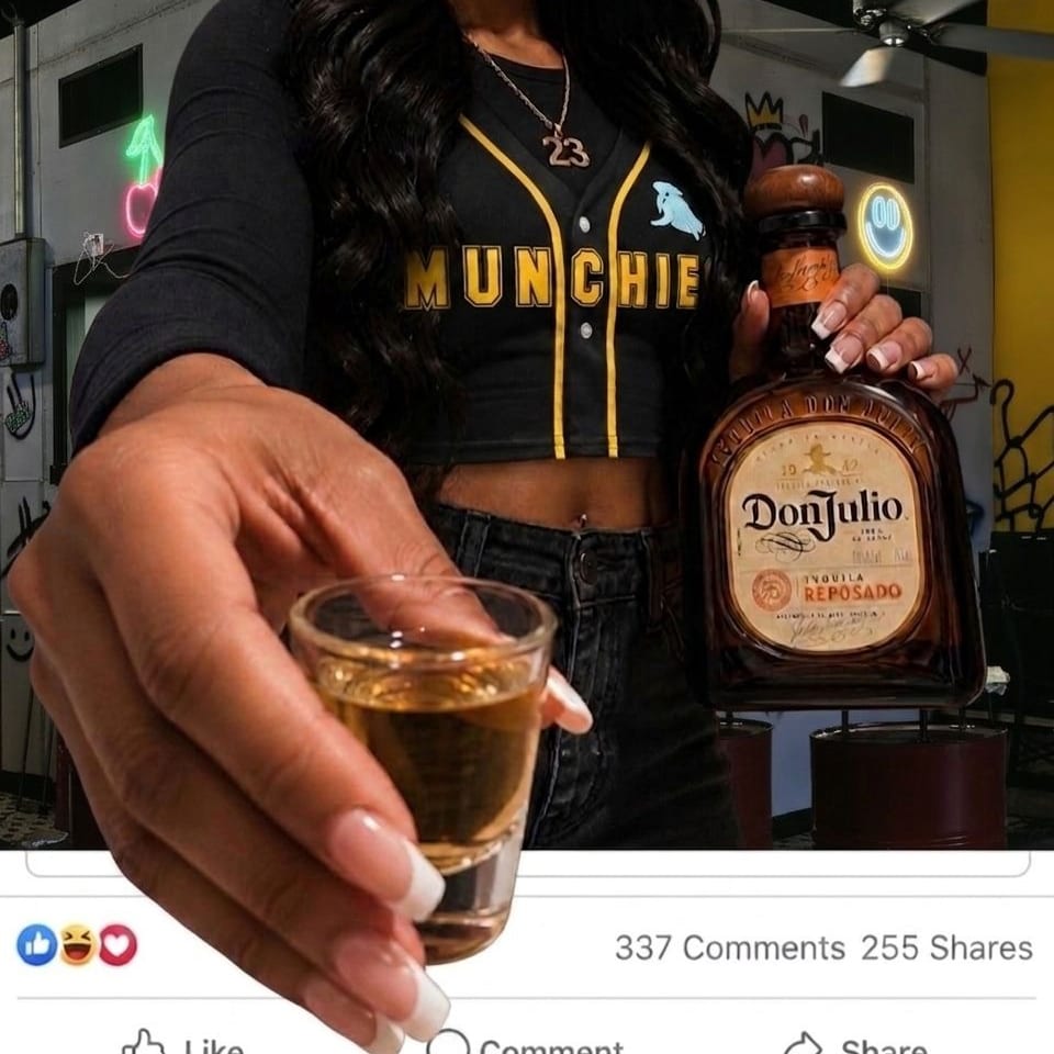 A person in a "MUNCHIE" shirt holds a Don Julio tequila bottle and a shot glass.